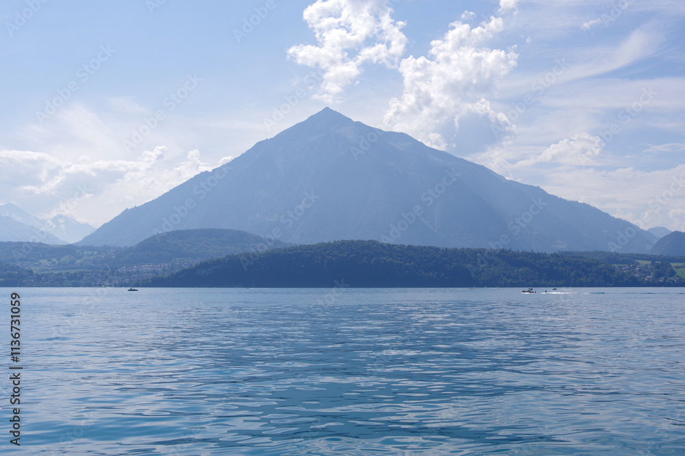 The beautiful blue Lake Thun in Switzerland The beautiful blue Lake Thun in Switzerland