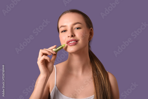 Beautiful young woman apply...