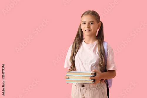 Young schoolgirl with pigta...