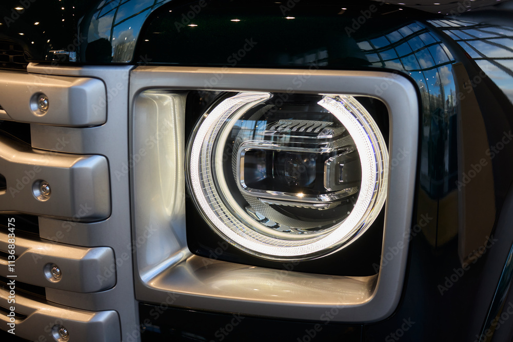 Close up of a cars headlight, part of automotive design Close up of a cars headlight, part of automotive design