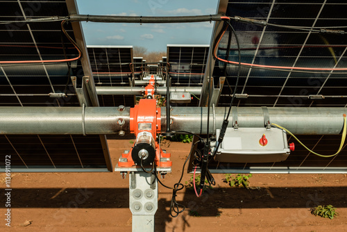 Details of rotor parts and main shaft in circular section tube in galvanized carbon steel for clean energy generation, with a communication antenna of the automation system