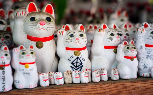 Gotokuji Temple: Tokyo's Birthplace of Maneki Neko 'Lucky Cat' Shinto Shrine for good fortune and Cat Lovers. Porcelain figure and temple details