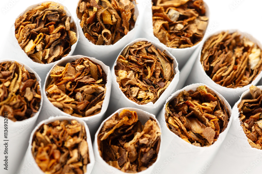 Close up macro cigarettes background from above. Tobacco background Close up macro cigarettes background from above. Tobacco background