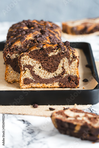 Canvas Print Slices of chocolate and banana marble loaf cake made with whole wheat flour and spelt flour