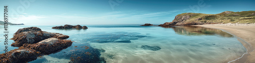 Peaceful beach and stones in water, panoramic view of landscape with clean ocean and blue sky. Concept of sea, web, banner, summer