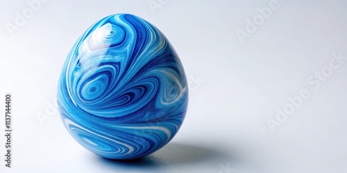 Blue Swirl Pattern on Ceramic Egg, blue swirl pattern, ceramic egg, blue design, swirl patterns, geometric