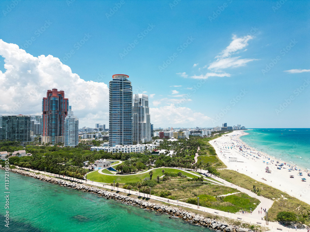 Obraz premium Miami Beach scene from drone, Florida, USA. Miami seaside. Aerial view of Miami Beach and cityscape. Coastline of Miami Beach, aerial view. Famous American landmarks. Summer travel in USA.