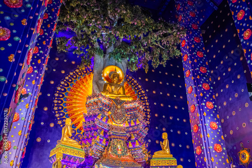 Wat Klang Khlong Watthanaram, or Wat Muang, in Sena, Ayutthaya, is famed for its vibrant purple ordination hall and intricate decorations, making it a notable landmark in the area.