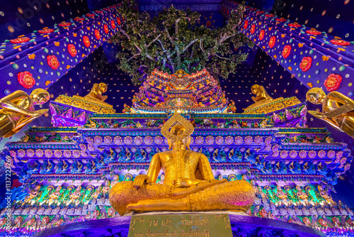 Wat Klang Khlong Watthanaram, or Wat Muang, in Sena, Ayutthaya, is famed for its vibrant purple ordination hall and intricate decorations, making it a notable landmark in the area.