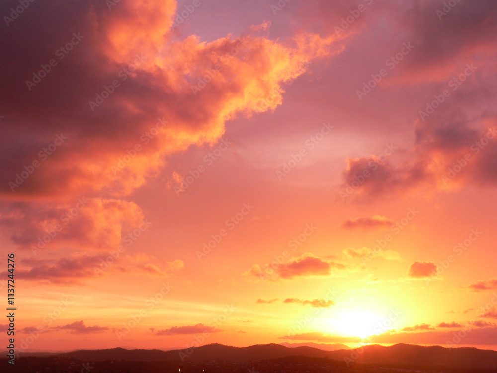 Fototapeta premium Colourful sky at sunset with pink and purple clouds