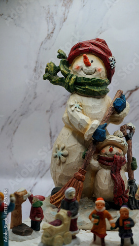 Christmas decorations, ointments, miniatures, trees, people with background of snow and rocks