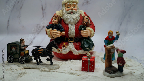 Christmas decorations, ointments, miniatures, trees, people with background of snow and rocks