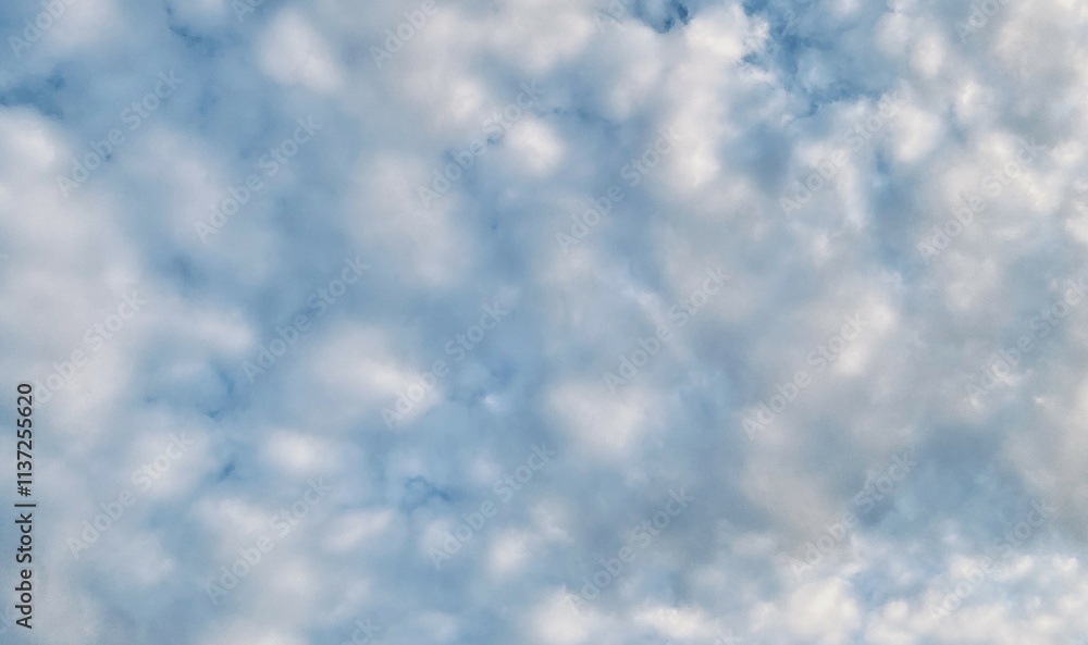 Beautiful sky with fluffy white clouds, soft and serene atmosphere, perfect for a clear and peaceful day Beautiful sky with fluffy white clouds, soft and serene atmosphere, perfect for a clear and peaceful day