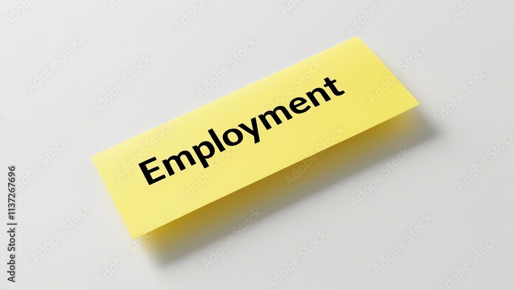 A bright yellow sticky note displays the word A bright yellow sticky note displays the word