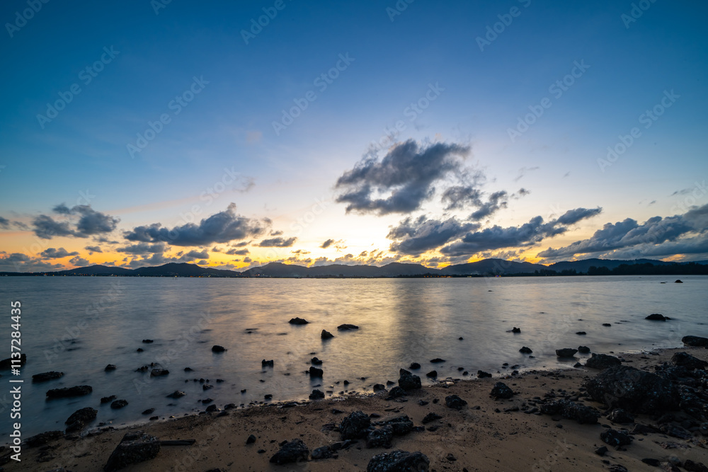 Beautiful clouds in sunset or sunrise over sea,Colorful scenery sunset sky, Amazing clouds wonderful light sky background Beautiful clouds in sunset or sunrise over sea,Colorful scenery sunset sky, Amazing clouds wonderful light sky background