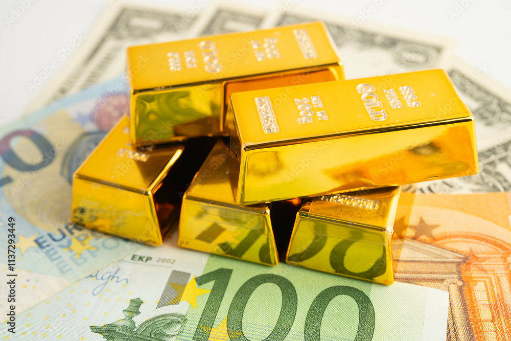 Gold bars with US dollar and Euro banknote money, finance trading investment business currency. Gold bars with US dollar and Euro banknote money, finance trading investment business currency.