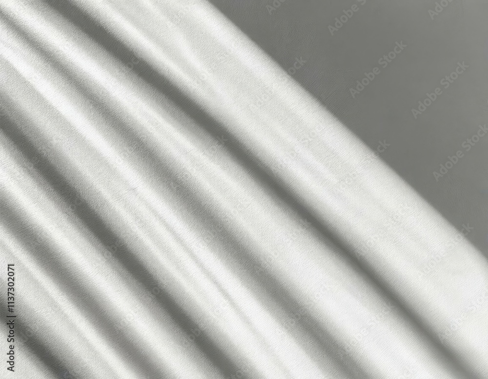 Fototapeta premium Soft light rays streaming across a smooth white surface, creating a serene and abstract background perfect for design, presentations, or creative projects. 
