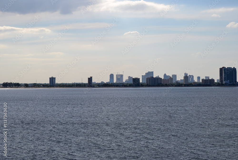 landscape with the calm Sea, with the city visible on the horizon landscape with the calm Sea, with the city visible on the horizon