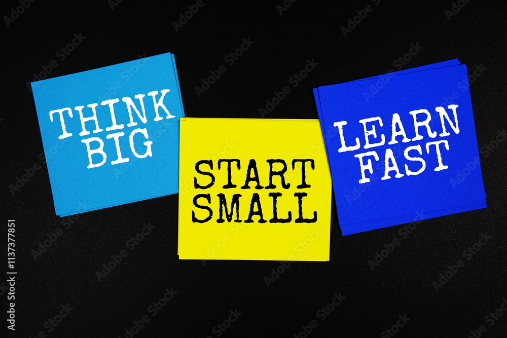 Think Big, Start Small, Learn Fast text on sticky note on black background Think Big, Start Small, Learn Fast text on sticky note on black background