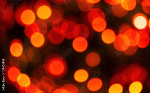 A blurred background of warm, glowing circular lights creating a festive atmosphere.