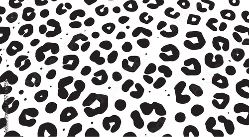 Seamless jaguar skin texture pattern in black and white for design and decoration use.