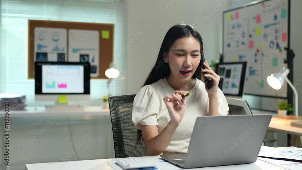 custom made wallpaper toronto digitalFemale office workers talk via smartphone and communicate online with customers, business partners, and various business people who invest in the business. Woman sitting at table in modern office.