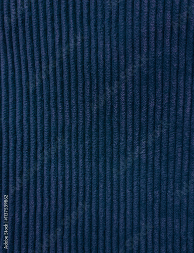 Corduroy fabric photographed close-up, prominent texture, suitable for clothing, bags, backgrounds