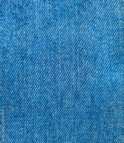 blue jeans Close-up photo of blue bright denim fabric prominent denim texture suitable for clothing feel the material