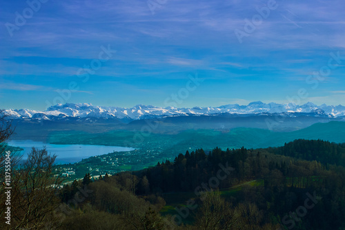 Snow clad Alps mountains and Zurich Lake from Uetliberg near Zurich photo