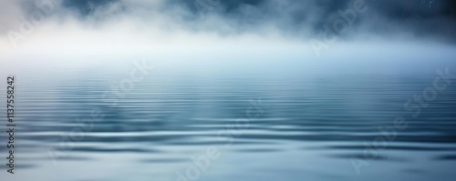 Mysterious fog concept. A tranquil scene of mist rising over calm water, evoking peace and natural beauty.