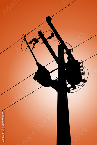 Silhouette of power lineman uses a clamp stick grip all type to install the line cover on energized high-voltage electric power lines. To change the lightning arresters that is damaged.