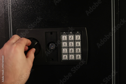 A close-up of a hidden in-wall safe discreetly installed within a wall. The sleek design emphasizes security and practicality for safeguarding valuables.