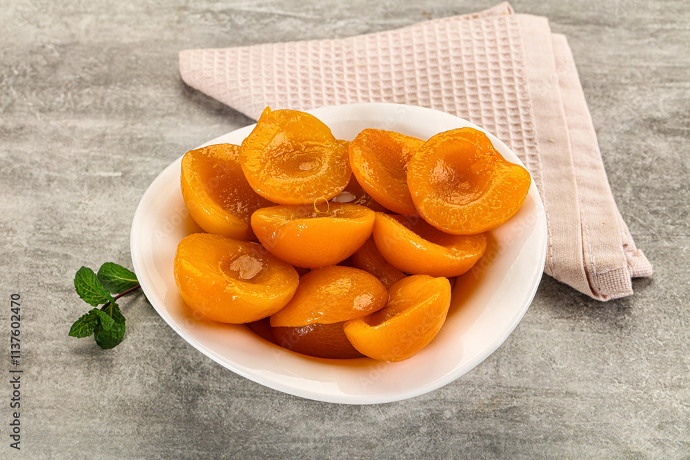 Sweet canned apricots with syrope Sweet canned apricots with syrope