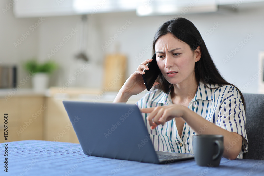 Angry asian woman talking on phone checking laptop at home Angry asian woman talking on phone checking laptop at home