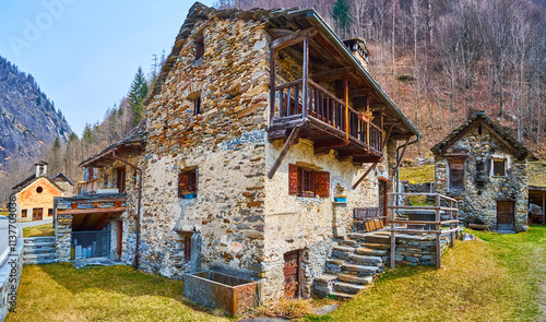 Traditional Ticinese torba houses in Cambleo, Val Lavizzara, Vallemaggia, Switzerland photo