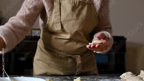 Woman Preparing Homemade Pastries photo