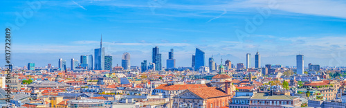 Obraz na płótnie The roofs ofhistoric buildings and the Milan Financial District in the background, Italy. w salonie