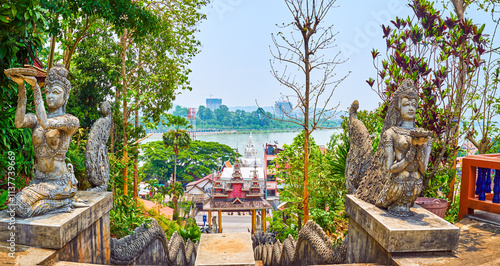 The staircases to Phrathat Pukhaw temple of hill of Ban Sop Ruak, Thailand photo