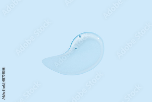 Cream and Gel Cosmetic Smear on Blue Background photo