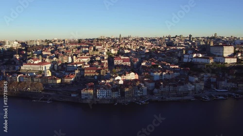 .Sunrise in Porto Old Port wine warehouse. photo