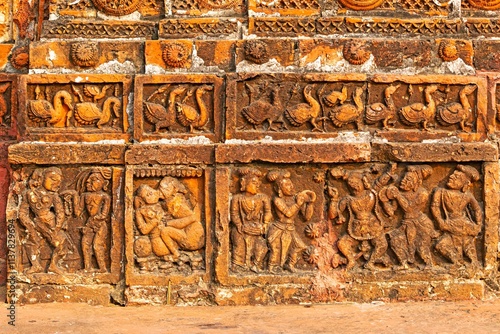 Unique terracotta carvings of musicians, erotic figures, and ducks on Ram Chandraji's Temple, Guptipara, Hooghly, West Bengal, India. photo