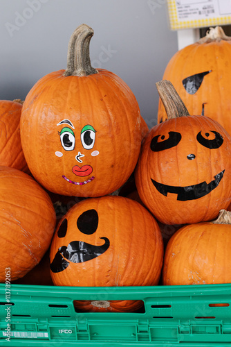 funny face pumpkins in a basket for sale for Halloween concepts