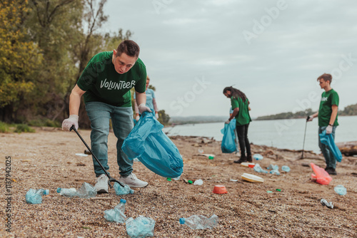 Volunteers cleaning plastic waste from riverbank: protecting the environment photo