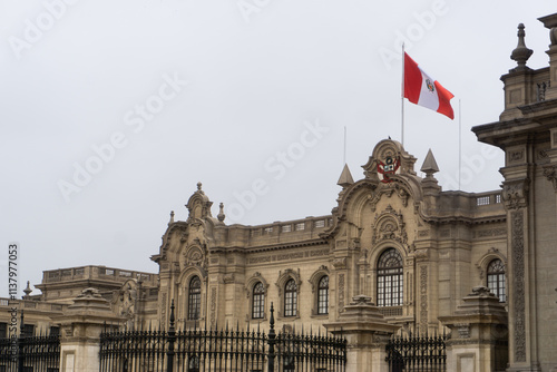 Lima Cathedral with Peru flag showcasing stunning colonial architectural details photo