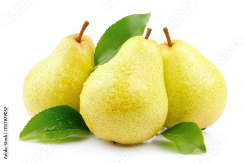 Fresh yellow pears with green leaves arranged together on a bright background showcasing their natural beauty