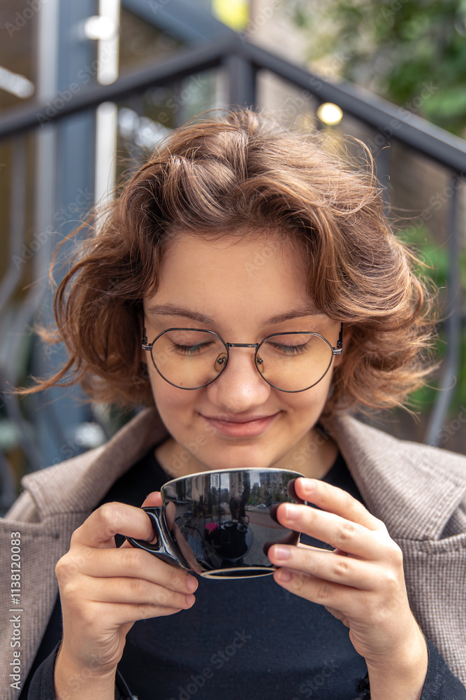 Happy girl with coffee in hands. Emotion concept. The emotion of happiness. Happy girl with coffee in hands. Emotion concept. The emotion of happiness.