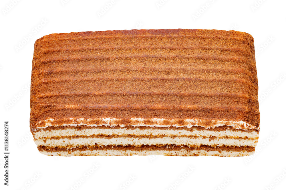 Slice of chocolate cake with milk filling, isolated on white background Slice of chocolate cake with milk filling, isolated on white background