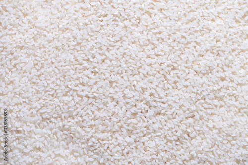 The background is made of white round grain rice.