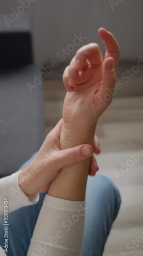 Wallpaper Mural Vertical video of female suffer from numbing pain in hand, numbness fingertip, arthritis inflammation, peripheral neuropathies, woman massage hand with wrist pain. Rheumatoid arthritis concept Torontodigital.ca