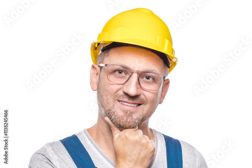 Closeup handsome construction worker with smile expressing, copy space for text, isolated on white background. Friendly repairman looking at you. Craftsman against white wall